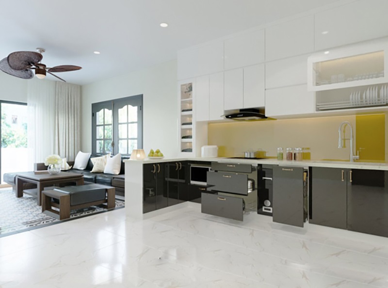 Tủ bếp phủ chất liệu Acrylic cùng lối thiết kế mở thông với phòng khách trông không gian rộng rãi hơn
