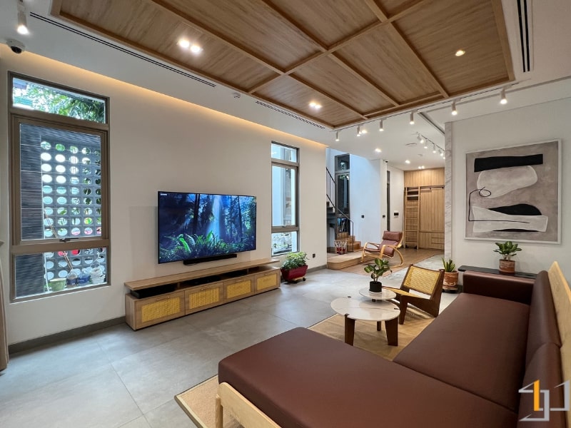 Tủ tivi gỗ công nghiệp kết hợp họa tiết đan mây mắt cáo