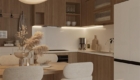 Tủ bếp màu nâu gỗ nổi bật trên lớp nền trắng kem của căn hộ VInhomes Golden River