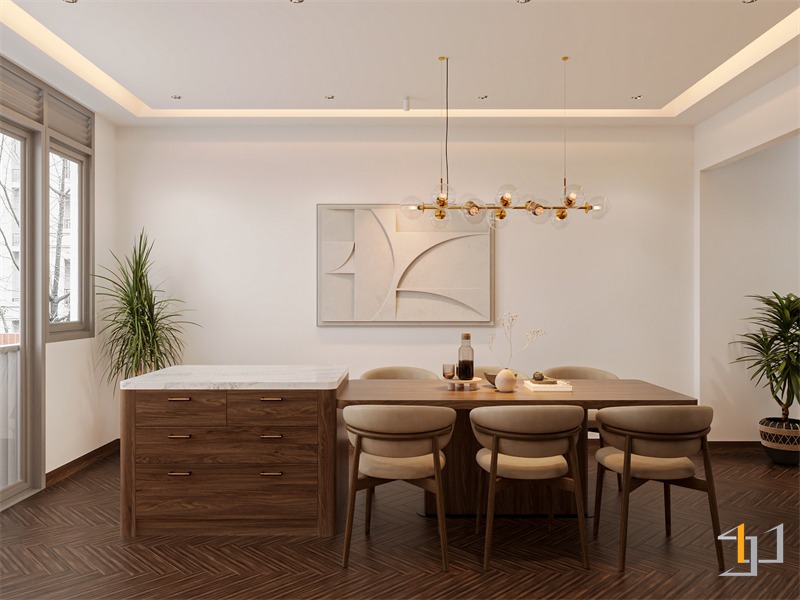 Điểm nhấn tinh tế đến từ tranh treo tường, đèn LED vàng âm trần tăng thêm sự ấm cúng cho gian bếp