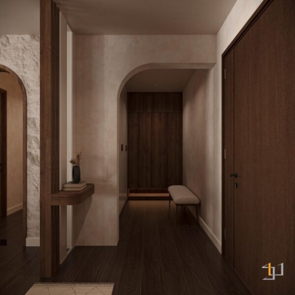 hành lang được thiết kế tinh tế, với vách ngăn gỗ và một chiếc bàn nhỏ trang trí ở lối vào