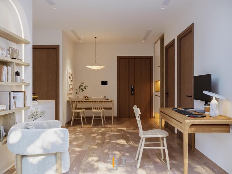 Lối vào căn hộ mở ra một không gian sinh hoạt chung, với bàn làm việc đặt sát tường