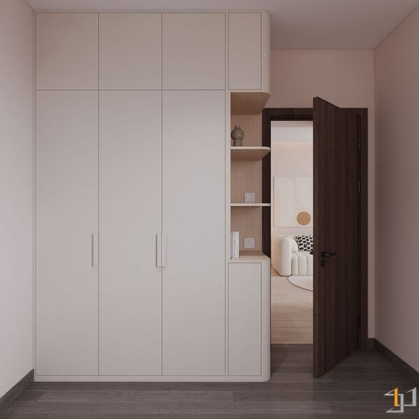 Tủ quần áo kịch trần màu be sáng, kết hợp kệ hở góc bo tròn để trưng bày đồ trang trí