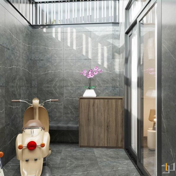 Khu vực để xe được thiết kế với gạch ốp lát màu xám đậm có vân đá sang trọng và có mái che sáng tạo bằng lam trắng