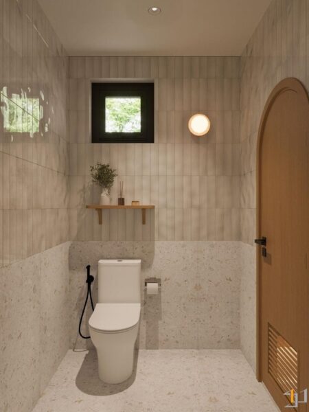 Khu vực bồn cầu sử dụng gạch ốp tương tự khu tắm, có cửa sổ nhỏ viền đen và kệ gỗ treo tường