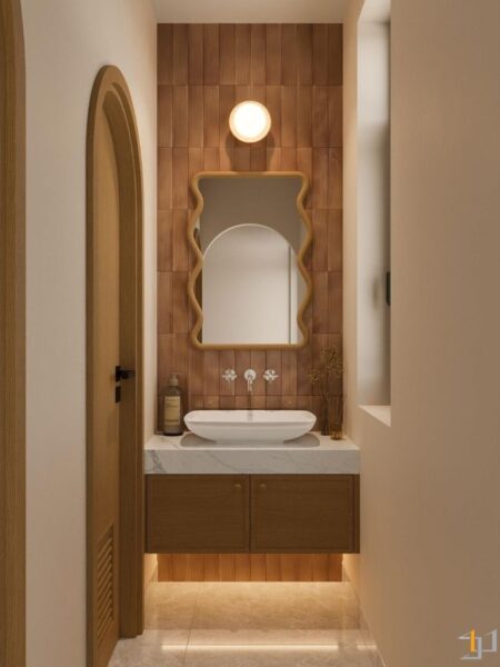 Khu vực chậu rửa được đặt trong hốc tường với gạch ốp màu đất nung