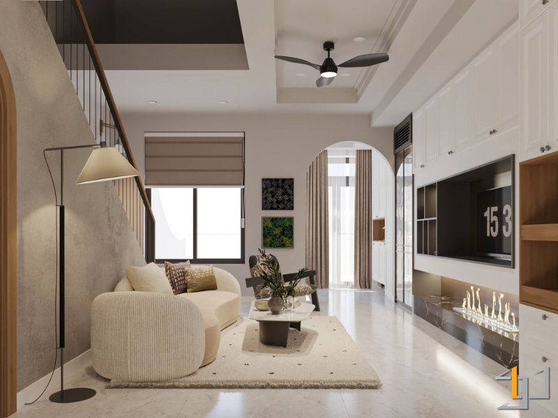 Phòng khách hiện đại tối giản với sofa cong, hệ tủ TV tích hợp lò sưởi, cầu thang gỗ và vòm cửa đón sáng.