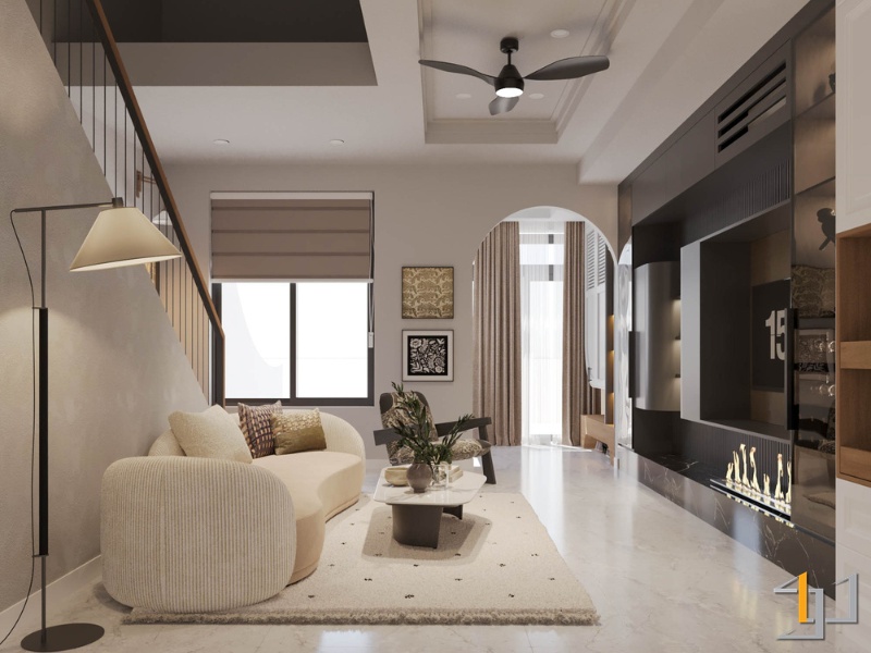 Phòng khách hiện đại tối giản với sofa cong, hệ tủ TV tích hợp lò sưởi, cầu thang gỗ và vòm cửa đón sáng.