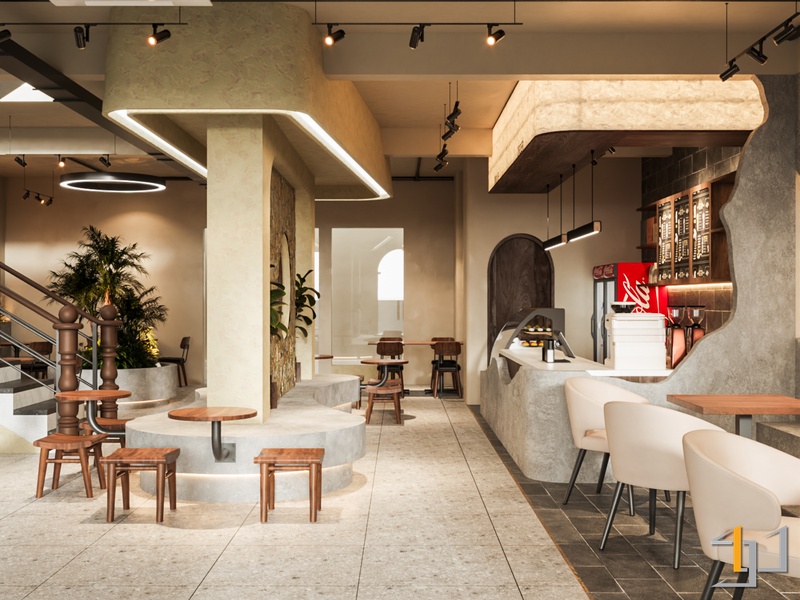 Nội thất quán cà phê phong cách Modern Mediterranean với tường đá, cầu thang và khu vực bàn ghế ấm cúng.