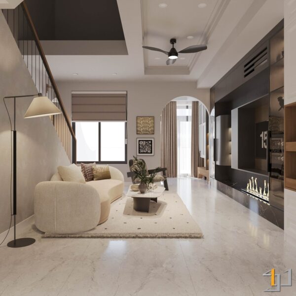Phòng khách hiện đại với sofa cong màu kem, tường TV tích hợp lò sưởi, sàn đá marble và cầu thang tối giản, tối ưu công năng và thẩm mỹ.